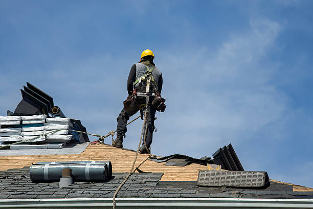 Professional Roof Replacement technician working in West Dennis, MA